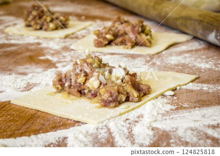 Manual cooking dumplings 124825818