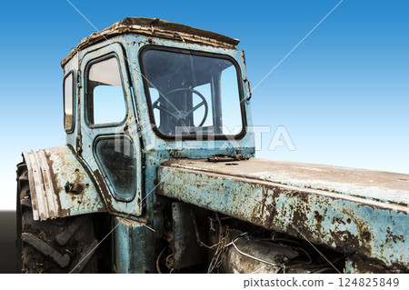 Old broken tractor 124825849