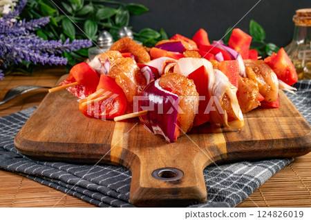 Raw chicken shashlik. 124826019