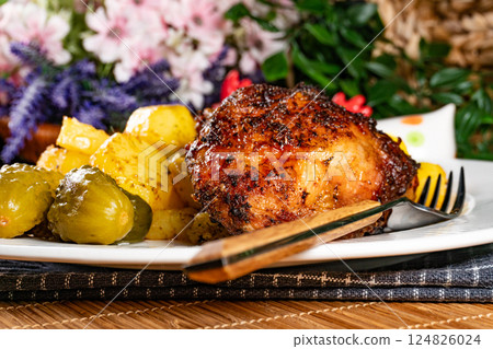Appetizing baked chicken leg quarter. Appetizing baked chicken leg quarter. 124826024
