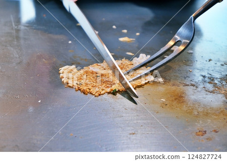 Making the garlic rice burnt Making the garlic rice burnt 124827724