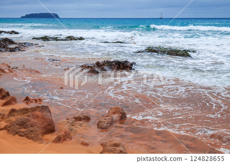 Landscape of Porto Santo, Portugal. A serene coastal scene with red rocks Landscape of Porto Santo, Portugal. A serene coastal scene with red rocks 124828655