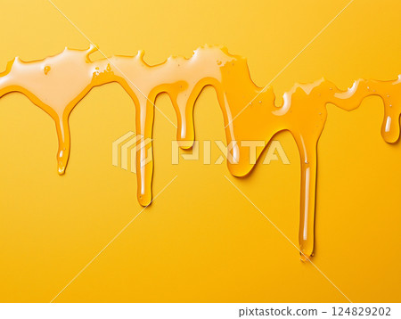 Yellow honey dripping liquid sweet pattern with vibrant texture, sticky syrup and abstract design Yellow honey dripping liquid sweet pattern with vibrant texture, sticky syrup and abstract design 124829202