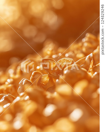 Close-up of crunchy buttery popcorn golden and delicious for snacktime cravings at cinema Close-up of crunchy buttery popcorn golden and delicious for snacktime cravings at cinema 124829246