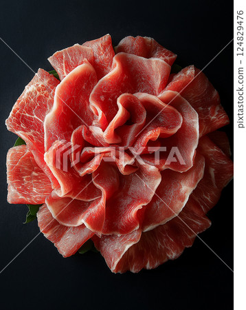 Delicious gourmet sliced meat showcasing fresh raw red ham as a culinary art. 124829476