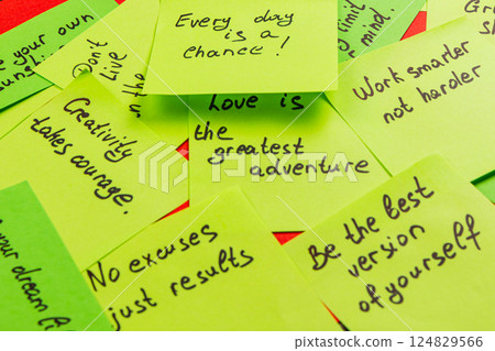 Motivational quotes on colorful sticky notes for daily inspiration 124829566