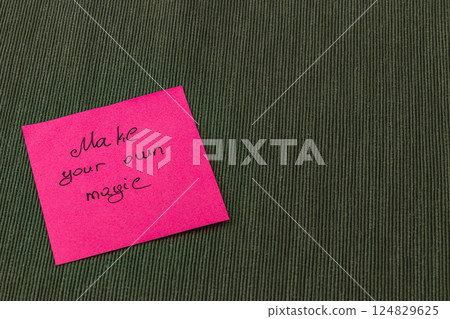 Create your own inspiration with a colorful sticky note on a warm backdrop Create your own inspiration with a colorful sticky note on a warm backdrop 124829625