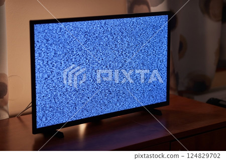 TV in a dim living room 124829702