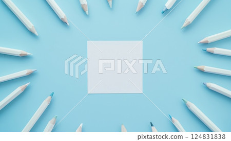White Pencils Arranged In A Square Shape On A Blue Pastel Paper With Ample Space For Copying Or Writing Purposes. 124831838