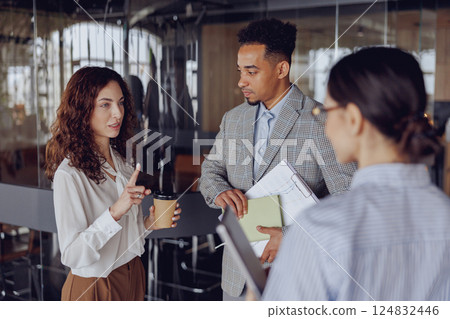 In a modern office environment, the business team is collaborating effectively and efficiently 124832446