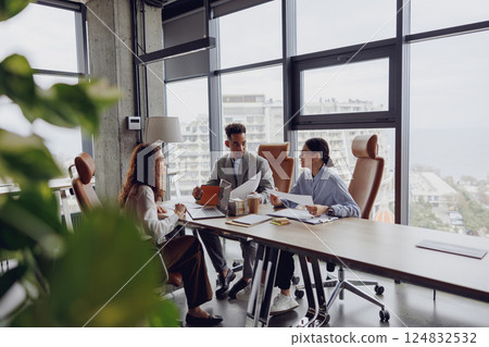 Scheduled Team Meeting in a Modern Office Space with Wonderful and Inspiring Views Ahead 124832532