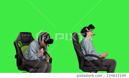 Frustrated gamer losing at video games on mobile phone app, playing with vr glasses and artificial intelligence against greenscreen. Displeased furious girl gets angry with her failure. Camera B. Frustrated gamer losing at video games on mobile phone app, playing with vr glasses and artificial intelligence against greenscreen. Displeased furious girl gets angry with her failure. Camera B. 124833194