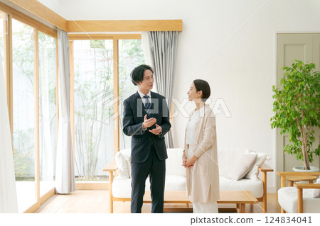 A salesman showing a property 124834041