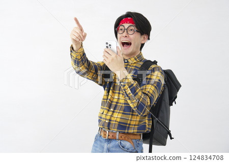 Akihabara-style man discovering something with a smartphone, white background 124834708