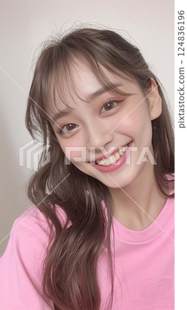 Asian woman taking a selfie Asian woman taking a selfie 124836196