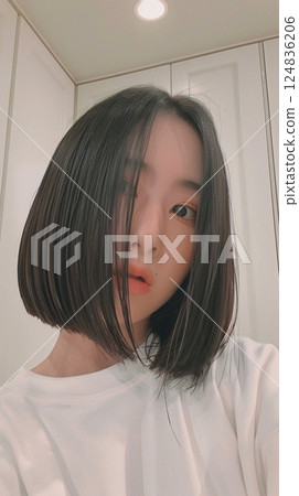 Asian woman taking a selfie 124836206