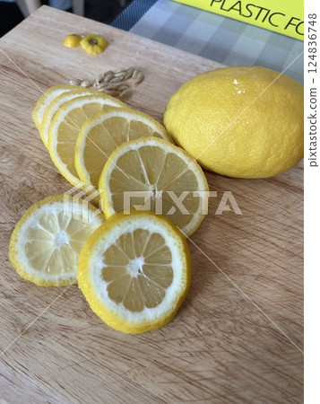 lemon on wooden table lemon on wooden table 124836748