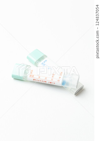 Stool test kit on white background 124837054