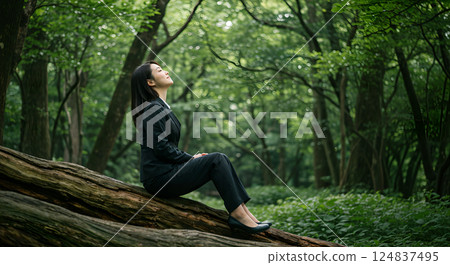 Japanese business woman relaxing in the forest, AI generated 124837495