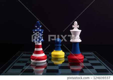 Chess made from flags of Ukraine, US and Russia Chess made from flags of Ukraine, US and Russia 124839337