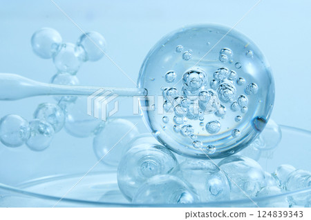 Abstract cosmetic laboratory. An artistic close-up of transparent molecules Abstract cosmetic laboratory. An artistic close-up of transparent molecules 124839343