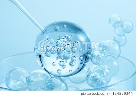 Abstract cosmetic laboratory. An artistic close-up of transparent molecules Abstract cosmetic laboratory. An artistic close-up of transparent molecules 124839344