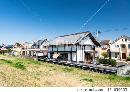 A stylish house built along the Tamagawa cycling road under the blue spring sky in Someji, Chofu, Tokyo A stylish house built along the Tamagawa cycling road under the blue spring sky in Someji, Chofu, Tokyo 124839665