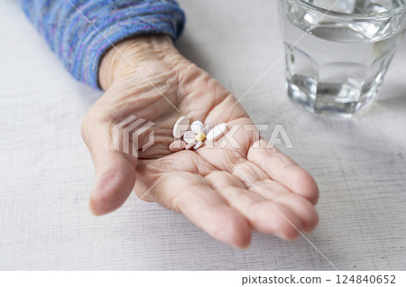 Grandmother's palm and medicine Grandmother's palm and medicine 124840652
