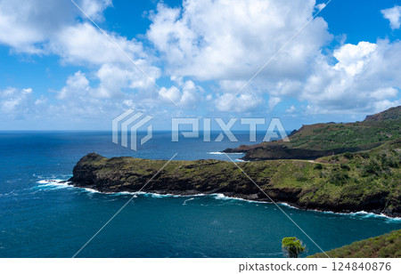 Coastal cliffs and turquoise bay near Puamau, Hiva Oa, Marquesas Islands, French Polynesia 124840876