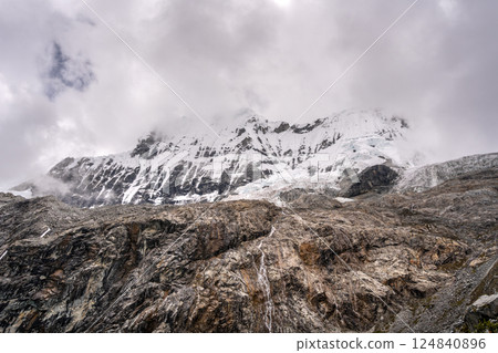 Laguna 69 with turquoise water and snowy mountains in Huaraz, Peru Laguna 69 with turquoise water and snowy mountains in Huaraz, Peru 124840896