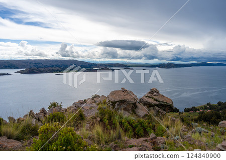 View of Lake Titicaca from Amantani Island under stormy clouds View of Lake Titicaca from Amantani Island under stormy clouds 124840900