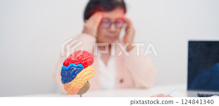 Elderly Patient consulting Doctor to Brain disease, Senior Health Medical Diagnosis. Anatomy Brain model for Explanation, Brain Tumor, neurological disorders, Dementia, alzheimer, parkinson and Mental 124841340