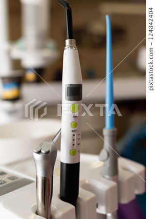 Dental tools ready for action in a modern clinic showcasing precision equipment and a clean environment to enhance patient care 124842404