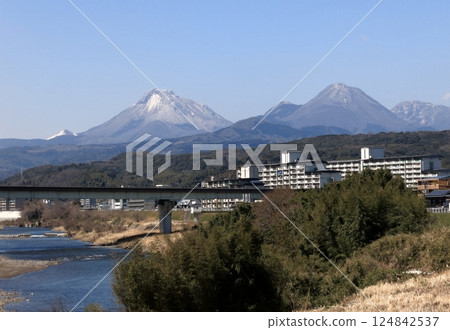 View of Mount Yufu and Mount Tsurumi from Myogasaki Bridge in Oita City. View of Mount Yufu and Mount Tsurumi from Myogasaki Bridge in Oita City. 124842537