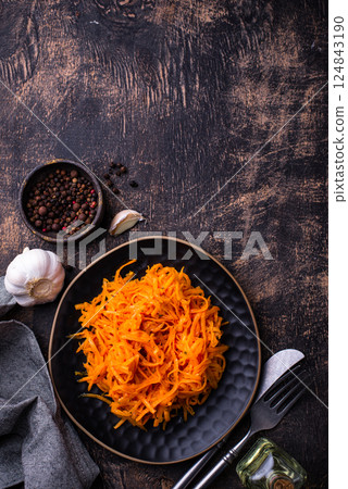 Spicy korean carrot salad in jar 124843190