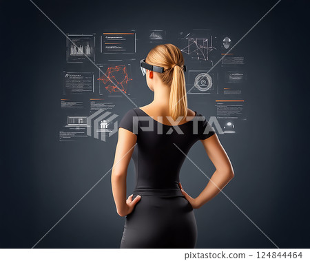 一名女性使用 VR 眼鏡檢查數據的圖片 一名女性使用 VR 眼鏡檢查數據的圖片 124844464