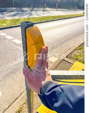 Hand Pushing Pedestrian Crossing Button, Street Safety, Urban Life. High quality photo 124844946