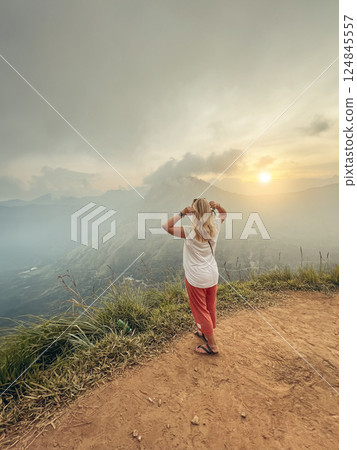 Blonde woman and sunset at Little Adam's Peak, Sri Lanka 124845557