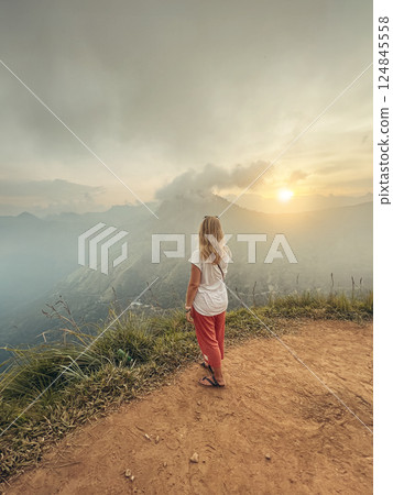 Blonde woman and sunset at Little Adam's Peak, Sri Lanka 124845558