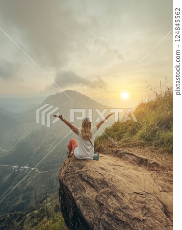 Blonde woman and sunset at Little Adam's Peak, Sri Lanka 124845562