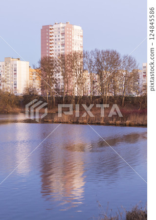 Sun set over a large water reservoir 124845586