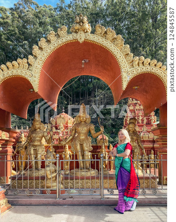 Woman dressed in sari near Seetha Amman Temple in Nuwara Eliya 124845587