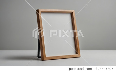 Wooden Picture Frame With Blank Canvas for Artistic or Decorative Purposes 124845807