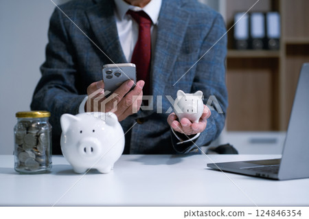 Male businessman think of the concept of saving money. 124846354