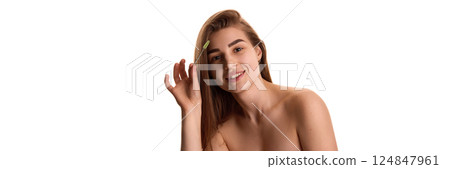 Banner. Beautiful woman with brush, combing her thick neat against white background with negative space to insert text. Banner. Beautiful woman with brush, combing her thick neat against white background with negative space to insert text. 124847961