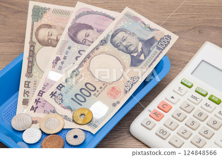Money, carton and calculator Money, carton and calculator 124848566