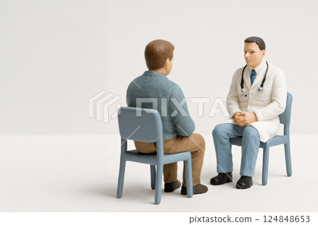 Doctor examining a patient at a mental clinic 124848653