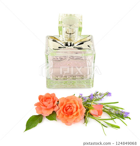 Perfume bottle and bouquet of flowers isolated on white background. 124849068