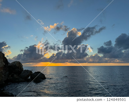 landscape, stones, rocks and the sea at sunset landscape, stones, rocks and the sea at sunset 124849501