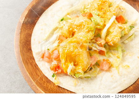 Shrimp Tacos with Shrimp, Vegetables, and Spices Wrapped in Tortillas Shrimp Tacos with Shrimp, Vegetables, and Spices Wrapped in Tortillas 124849595